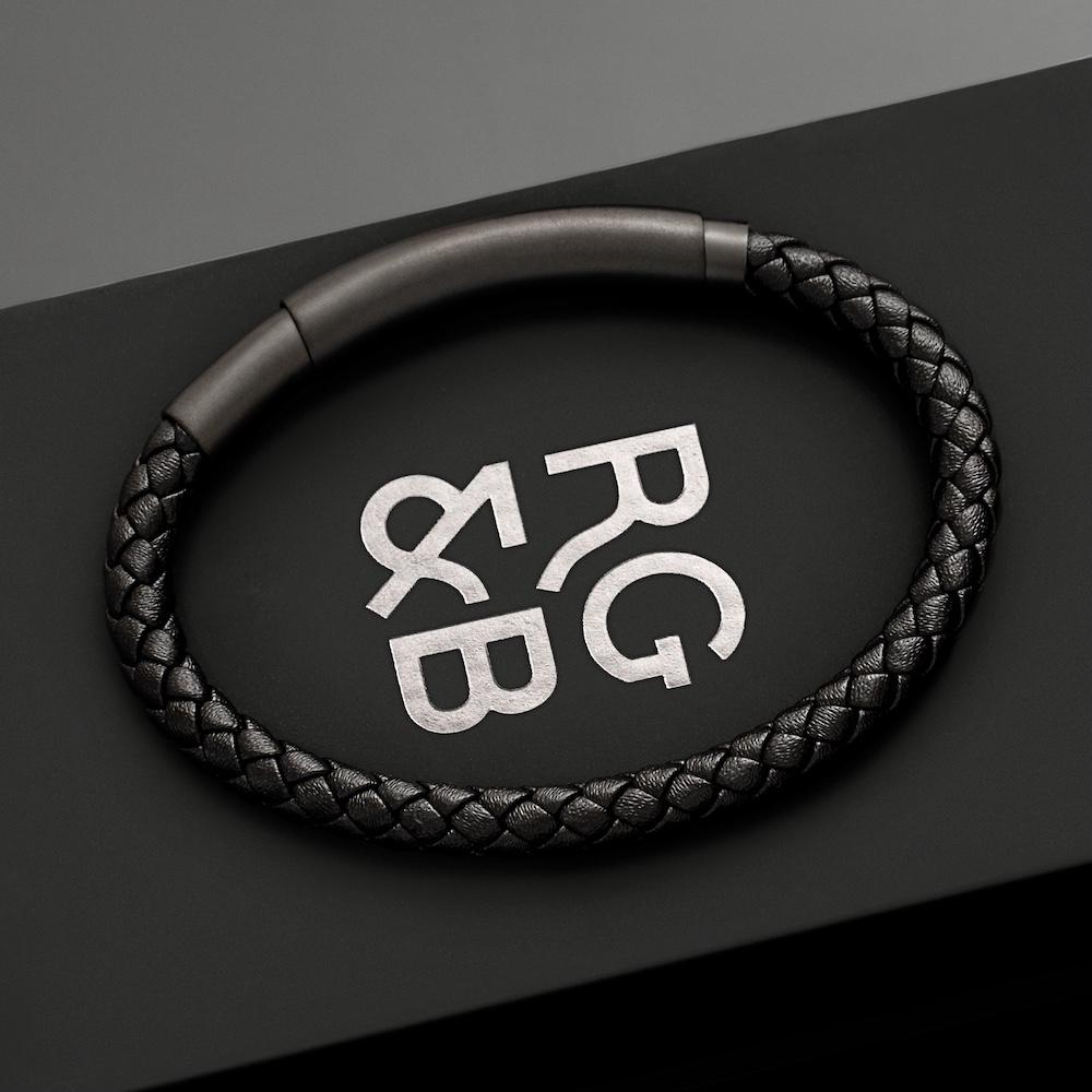 Black Leather Bracelet - Our Black Leather Bracelet features a Black Leather Bracelet and an Adjustable Black Steel Clasp Engraved with our Signature RG&B Logo.